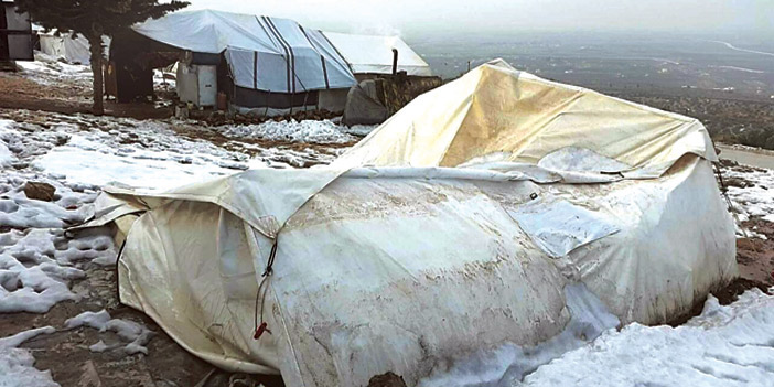  جانب من المخيمات السورية المتأثرة جراء الثلوج