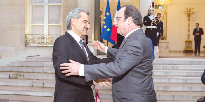   الرئيس الفرنسي مرحباً  بالأمير الوليد