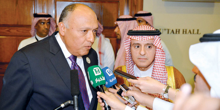  الجبير وسامح شكري خلال لقاء صحفي في عمان عقب ختام القمة العربية