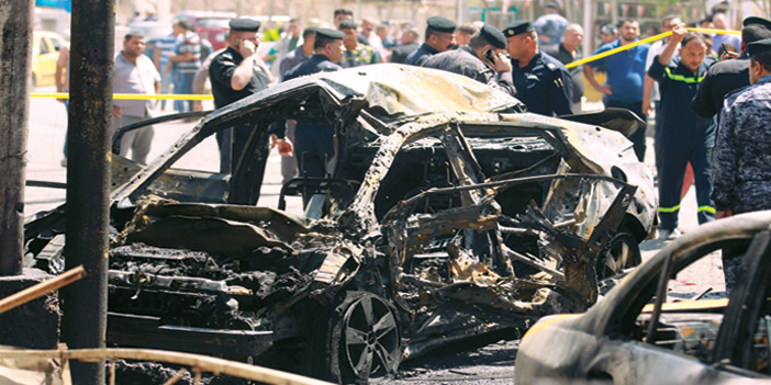  الدمار الذي خلَّفه الانفجار الذي وقع بحي الكرادة في بغداد