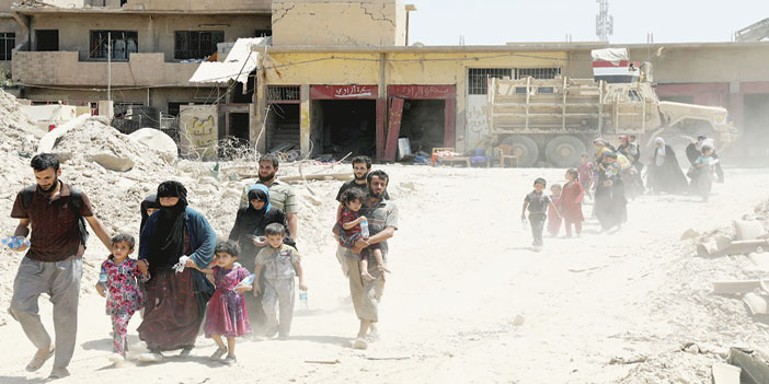  الأسر العراقية تنزح من الموصل القديمة مع شدة المواجهات