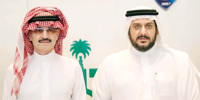  الأمير الوليد بن طلال مع الأمير نواف بن سعد خلال توقيع الشراكة