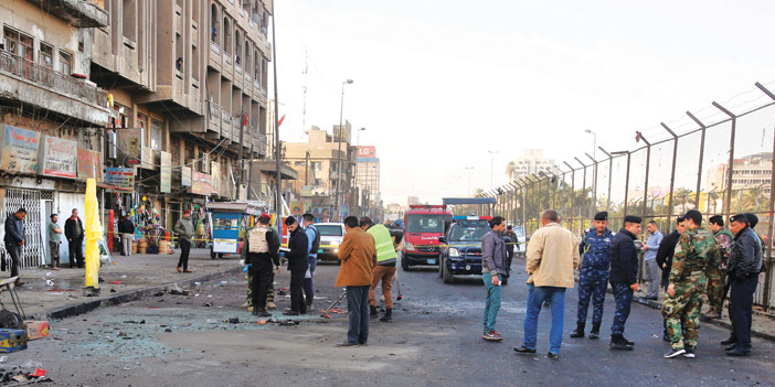  موقع الانفجار الانتحاري في بغداد والذي أدى إلى قتلى وإصابات ودمار للمحلات المجاورة