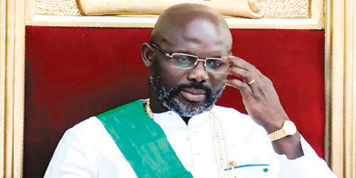 أسطورة كرة القدم جورج ويا رئيسا لليبيريا 