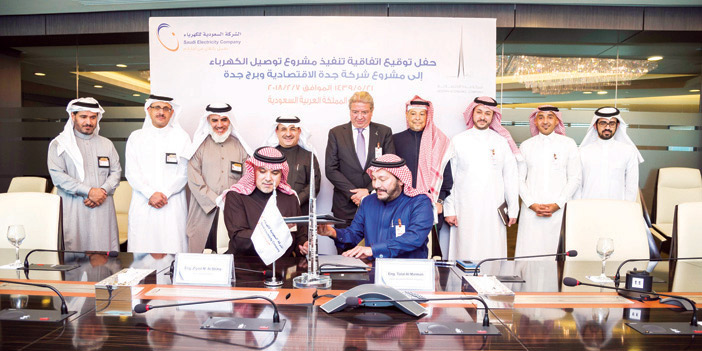   جانب من توقيع الاتفاقية