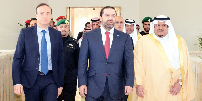   الأمير محمد بن عبدالرحمن في وداع الرئيس الحريري