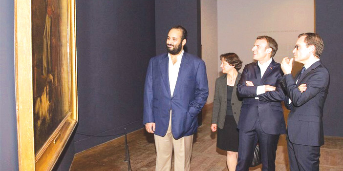  ولي العهد الأمير محمد بن سلمان والرئيس الفرنسي في متحف اللوفر