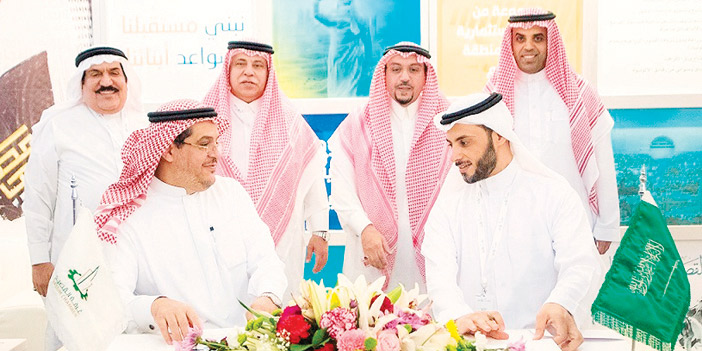  امير منطقة القصيم ووزير التجارة يشهدان التوقيع
