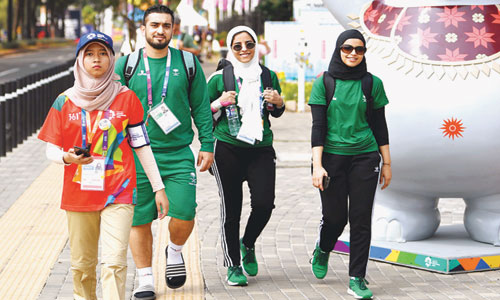 سعوديون في طريقهم لافتتاح الألعاب الآسيوية 