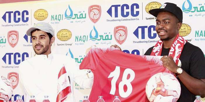  الرئيس المرشح أمين الملاّح مع اللاعب أكرم هوسة