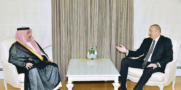  الرئيس الأذربيجاني خلال استقباله فيصل بن معمر