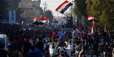مقتل 16 متظاهراً في بغداد على يد مسلحين 