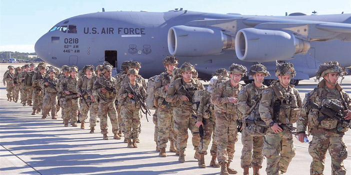  جنود أميركيون خلال توجههم من قواعدهم إلى بغداد