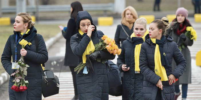  ذوو ضحايا الطائرة الأوكرانية خلال مراسم العزاء في كييف