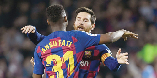  فاتي وميسي أعادا التوازن لفريقهما برشلونة