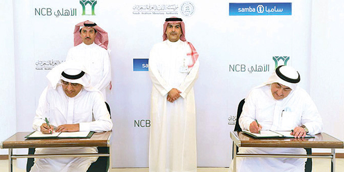  عمار الخضيري وسعيد الغامدي خلال توقيع الاتفاقية