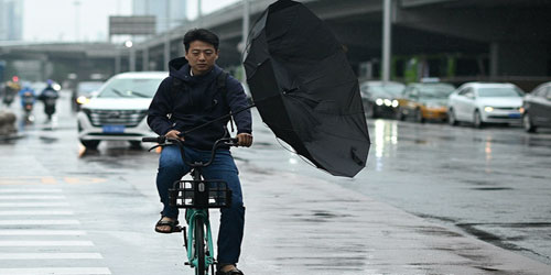 «عاصفة مطرية» تلغي رحلات بكين 