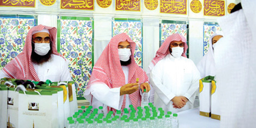  السديس وفريق العمل