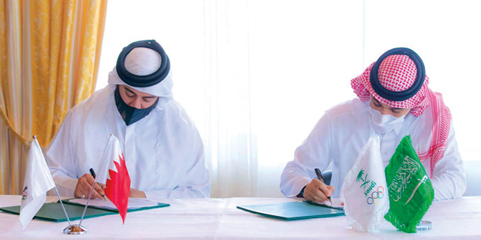  من توقيع اتفاقية التعاون مع رئيس الأولمبية البحرينية
