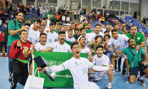  من احتفالية لاعبي الأخضر بالتأهل للعالمية