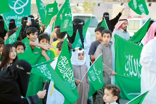 شوارع مدن ومحافظات المملكة تتوشح باللون الأخضر 