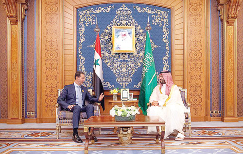 ولي العهد خلال لقائه بشار الأسد