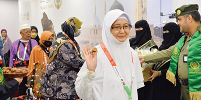 أولى رحلات المستفيدين من مبادرة «طريق مكة» من ماليزيا تصل المملكة 