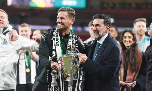  الرميان محتفلاً بالكأس