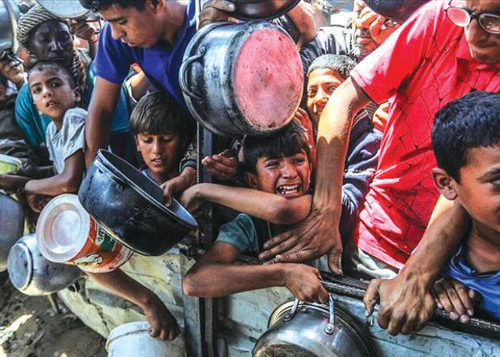 ارتفاع وفيات التجويع إلى 348 بينهم 127 طفلاً بغزة 