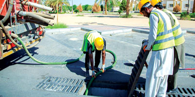 صيانة شبكات تصريف الأمطار في تبوك 