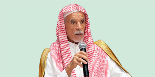  د.الفيصل ملقيًا المحاضرة